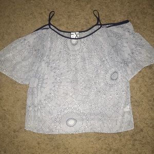 Blue and white patterned blouse